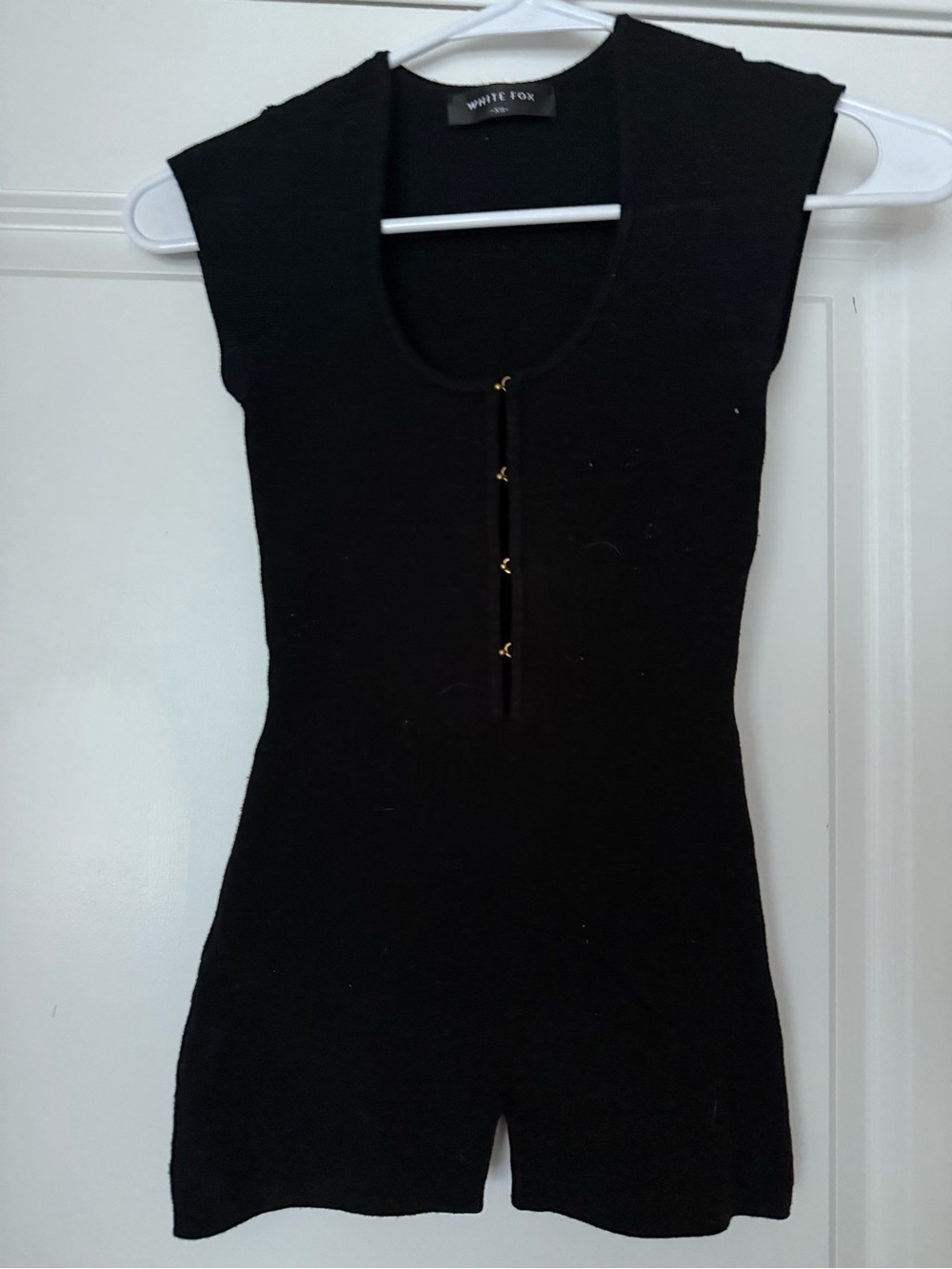 White Fox Boutique Black Sleeveless Knit Romper with Gold Hook Accents